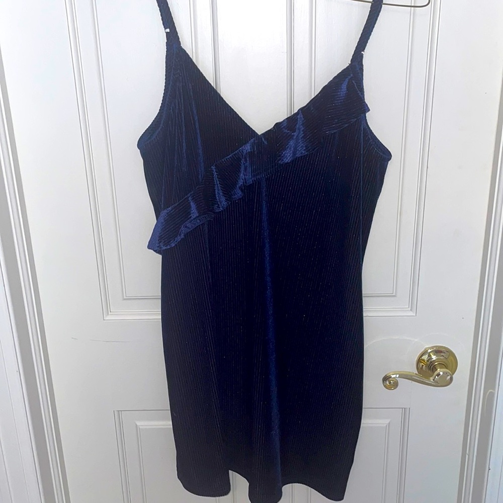 Velvet mini dress with sparkly ribbing and ruffle